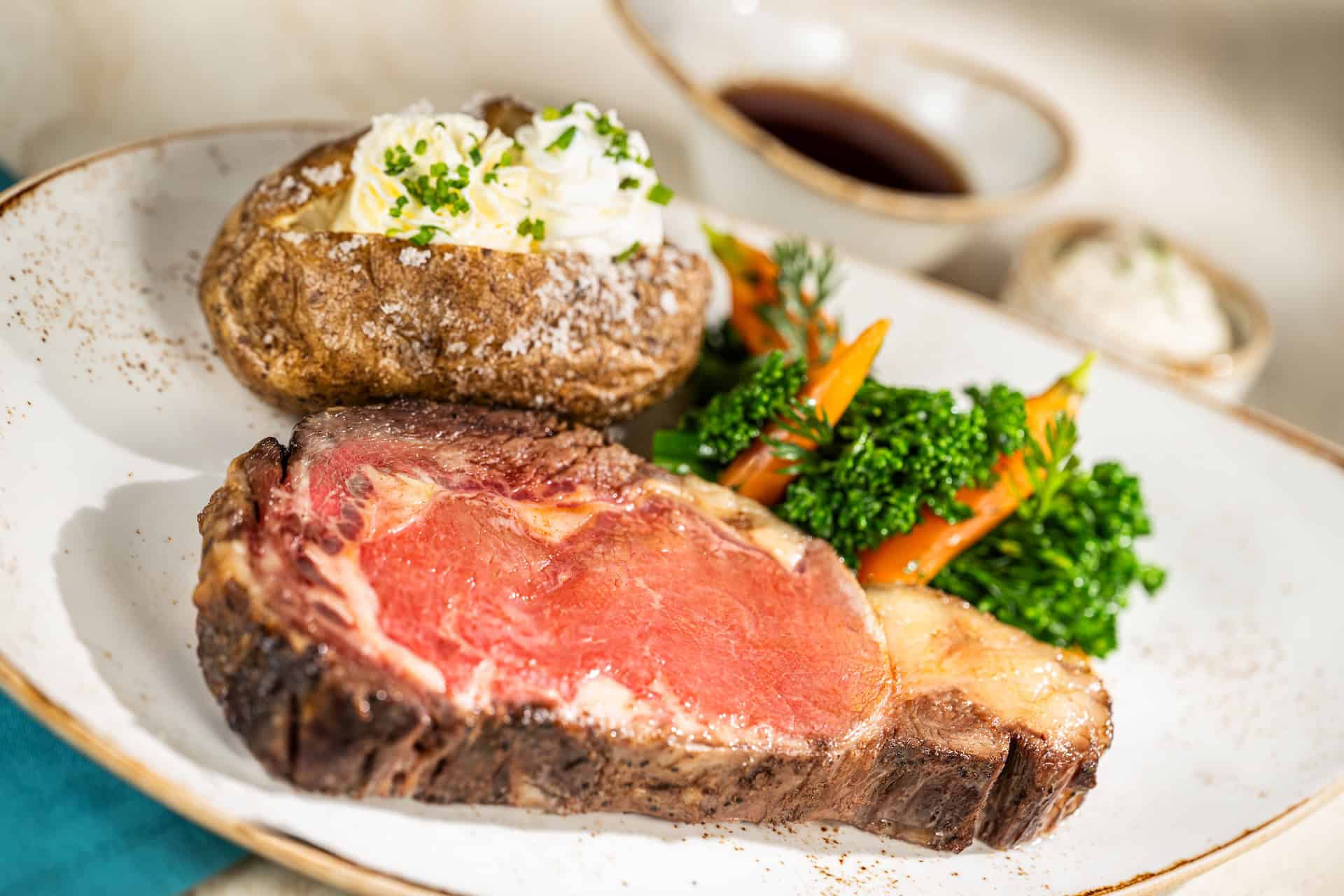 a slow-roasted prime rib from the Turf Club Bar and Grill
