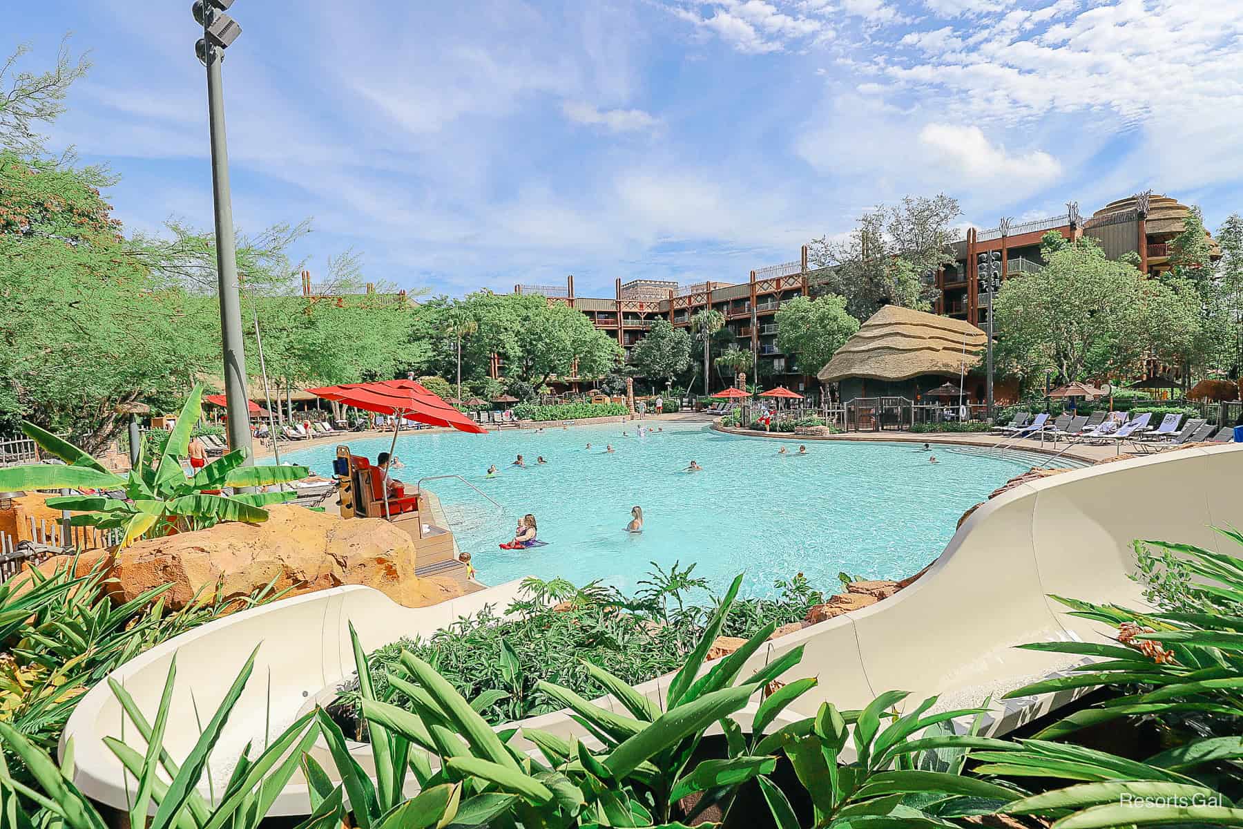 a slide entering the pool at Jambo House