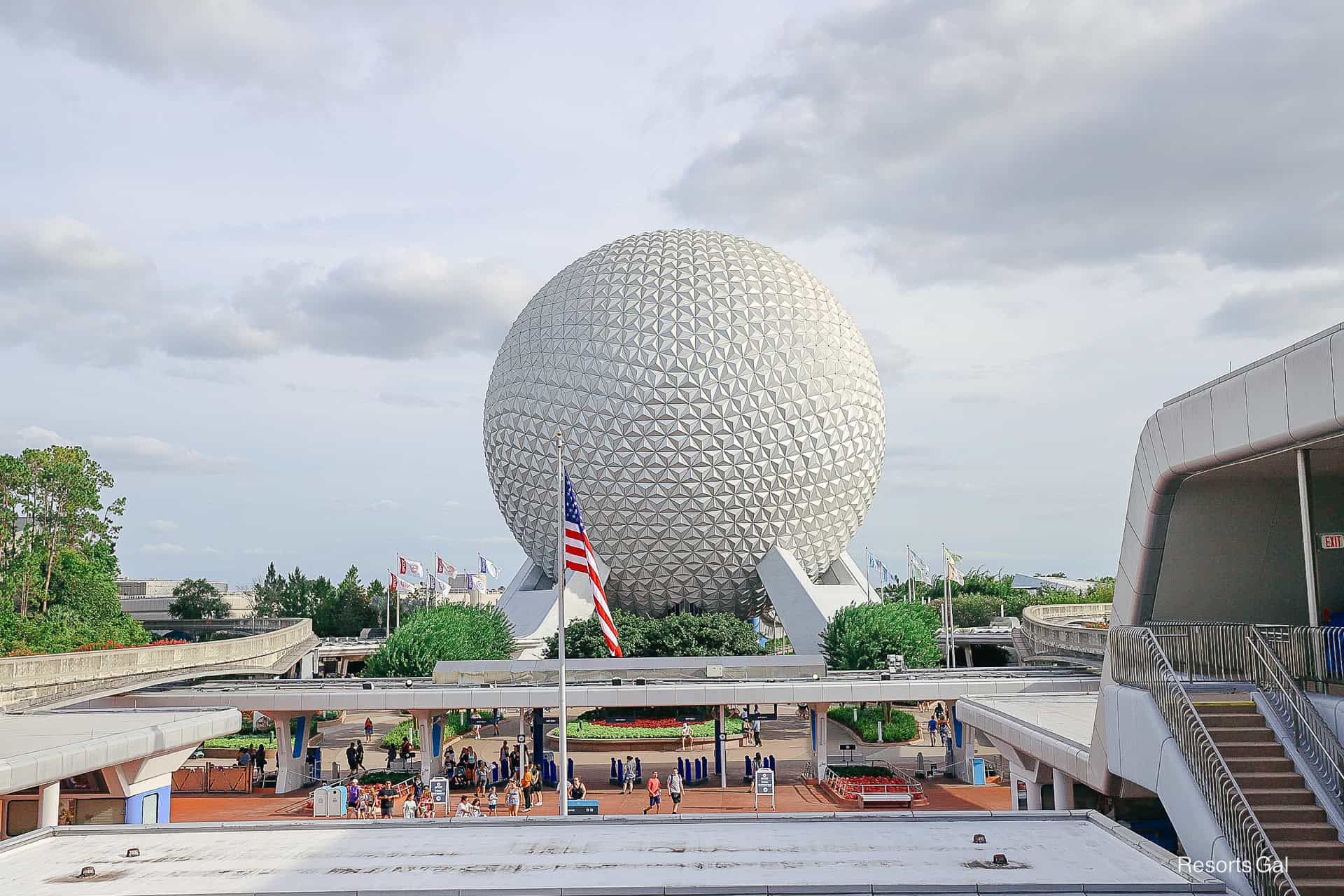 a view of Spaceship Earth from the monorail platform at Epcot
