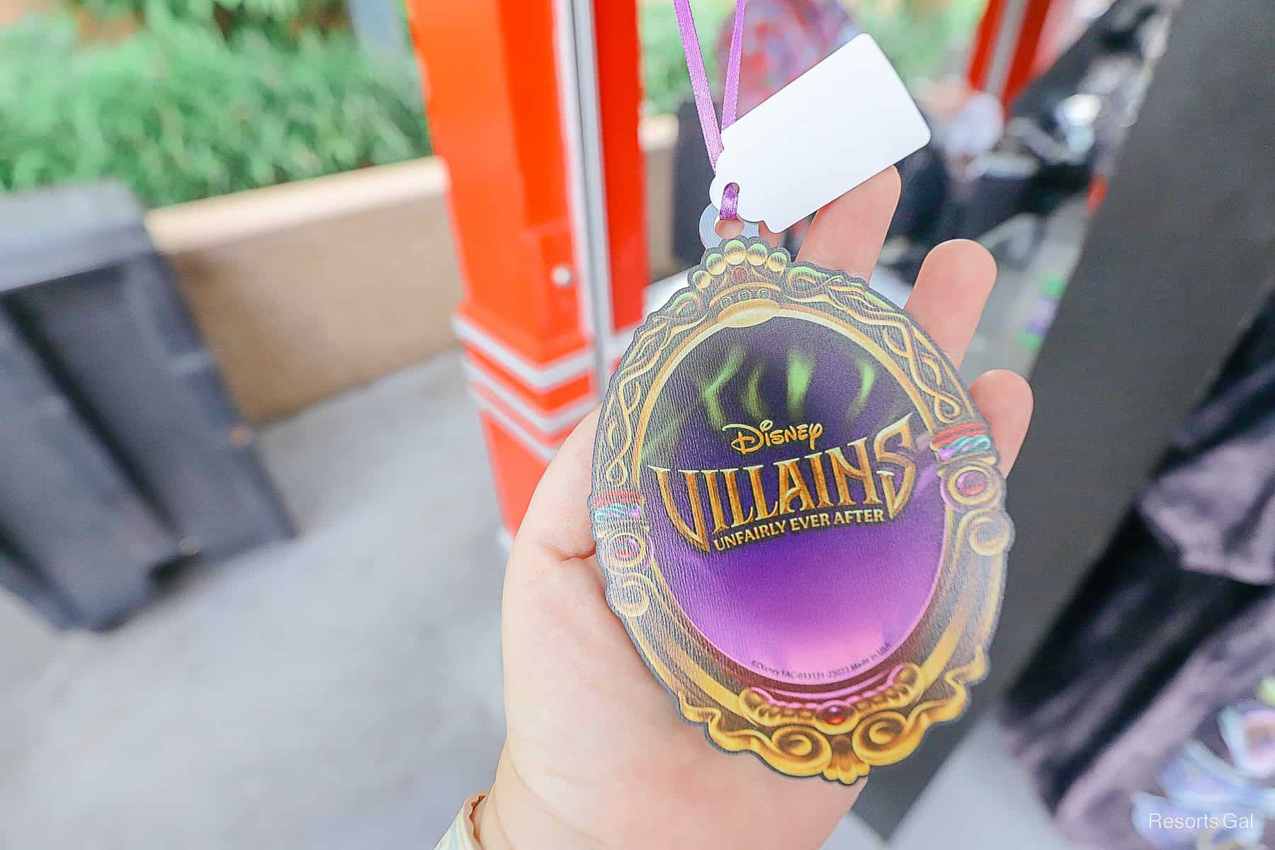 the back side of the ornament with the show's logo 