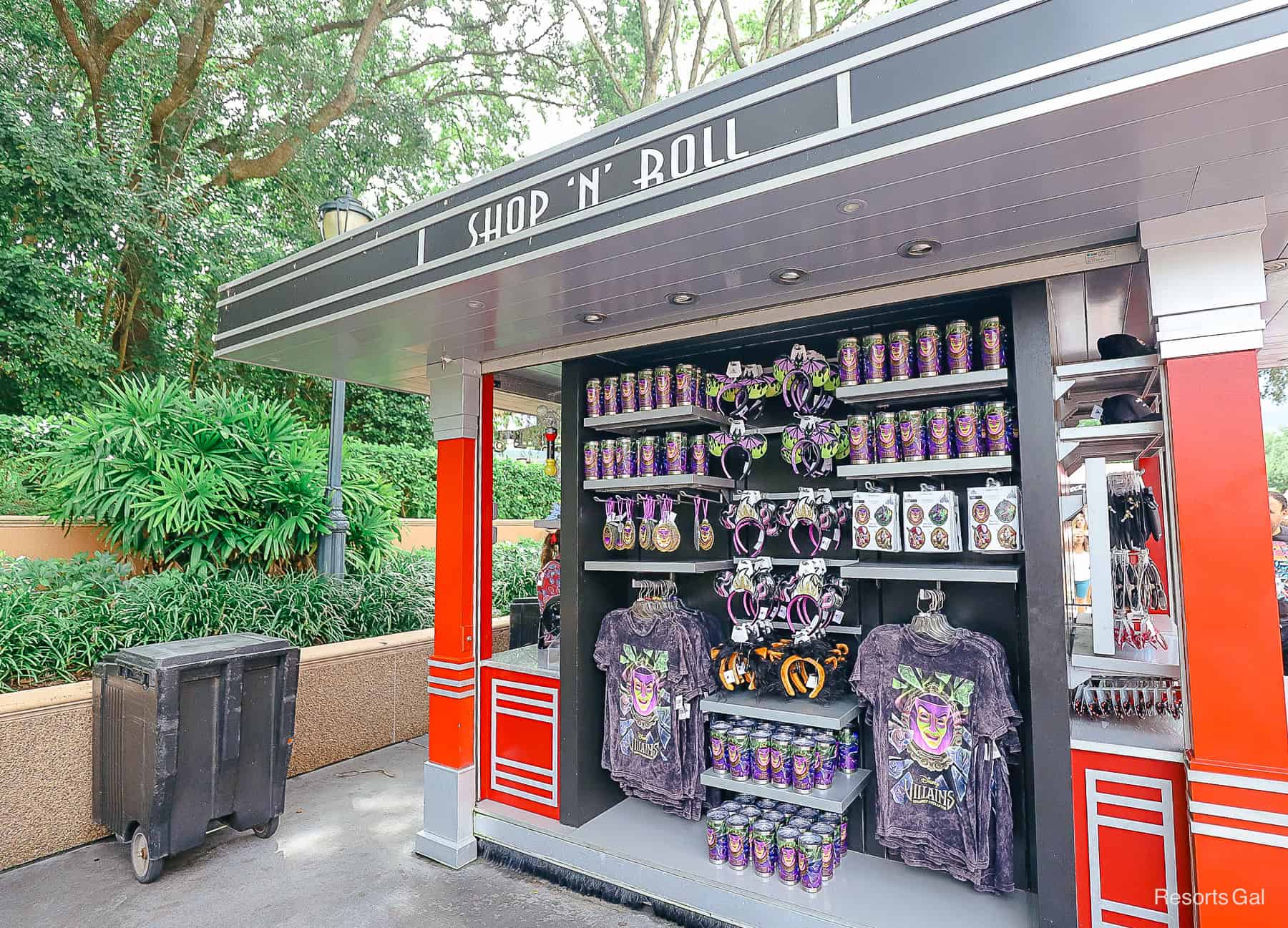 the Shop 'n' Roll kiosk with red and black trim offering Disney Villains merchandise 