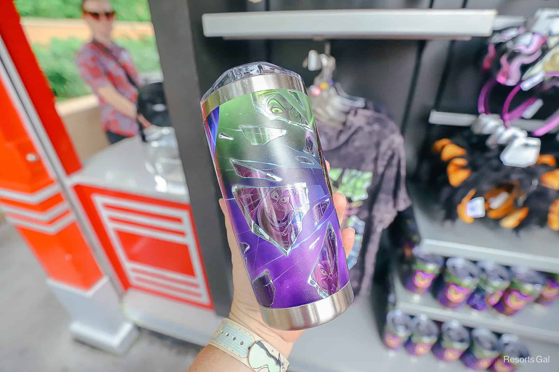 the back side of the tumbler features shards of mirror with villains 