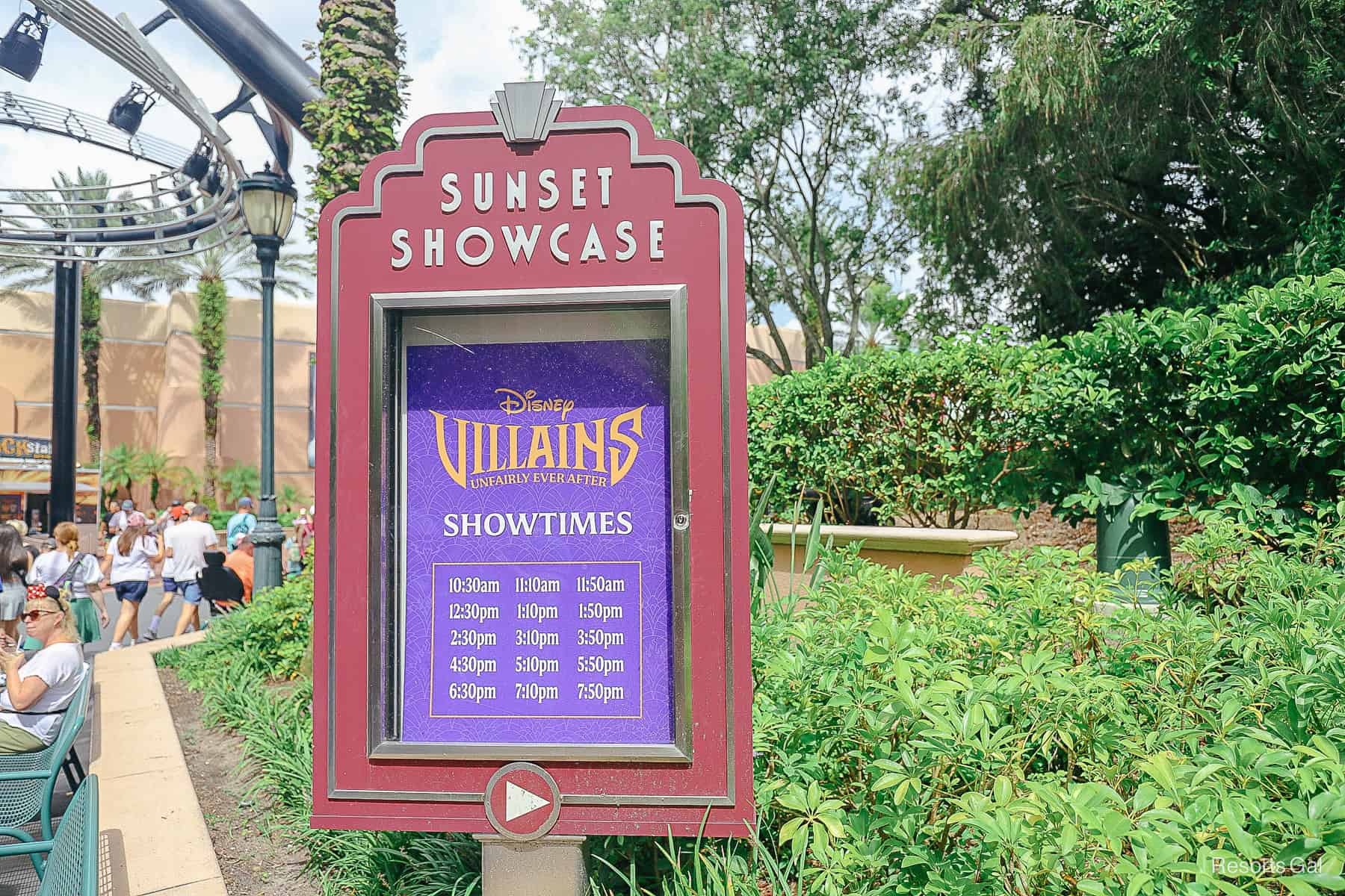 a sign that lists the showtimes for Disney Villains: Unfairly Ever After