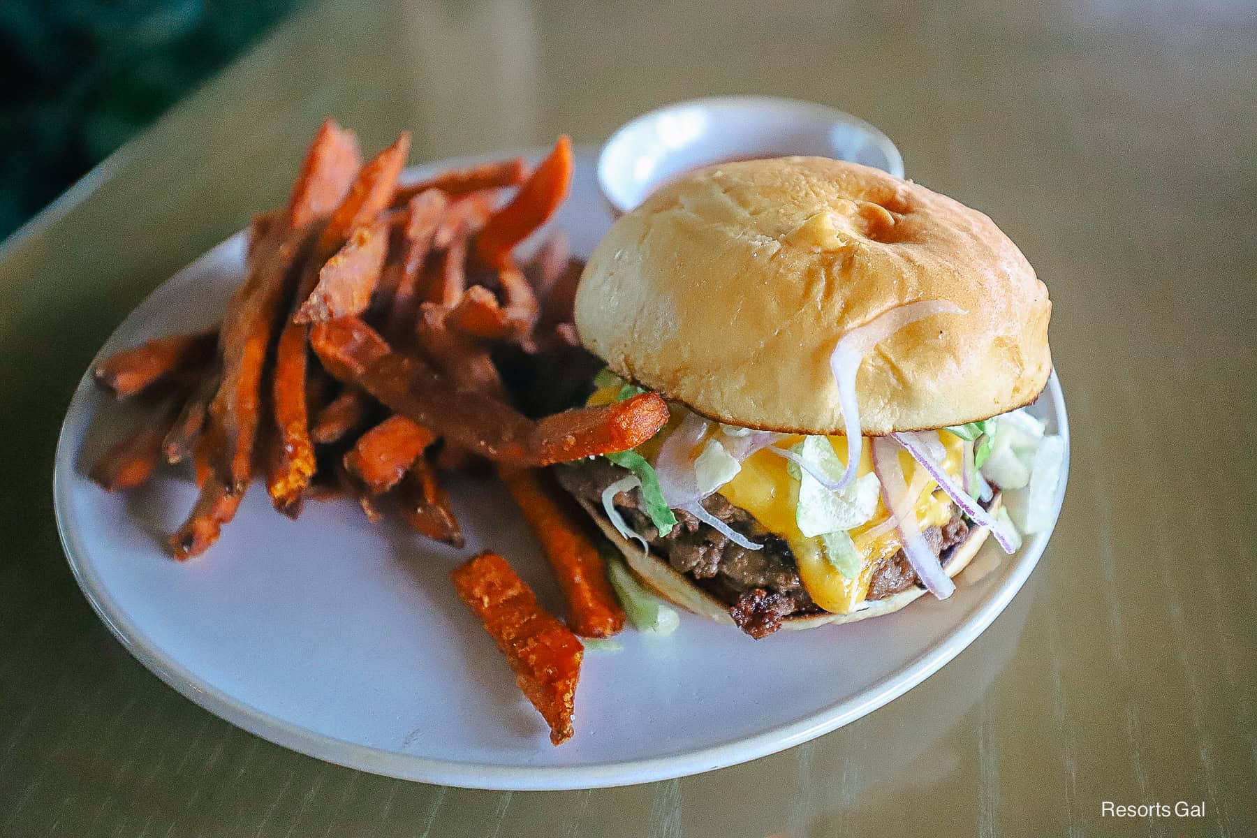 the burger with fries from Wailulu Bar and Grill 