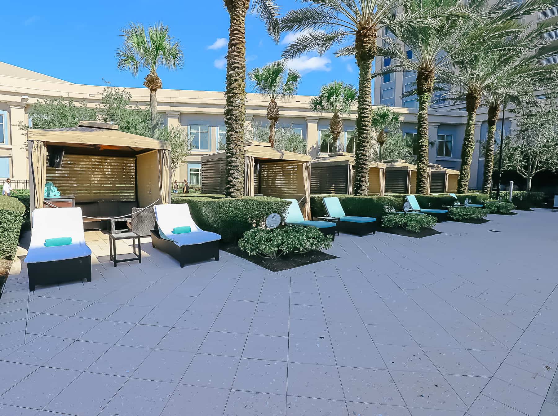 a row of cabanas that guests can rent 