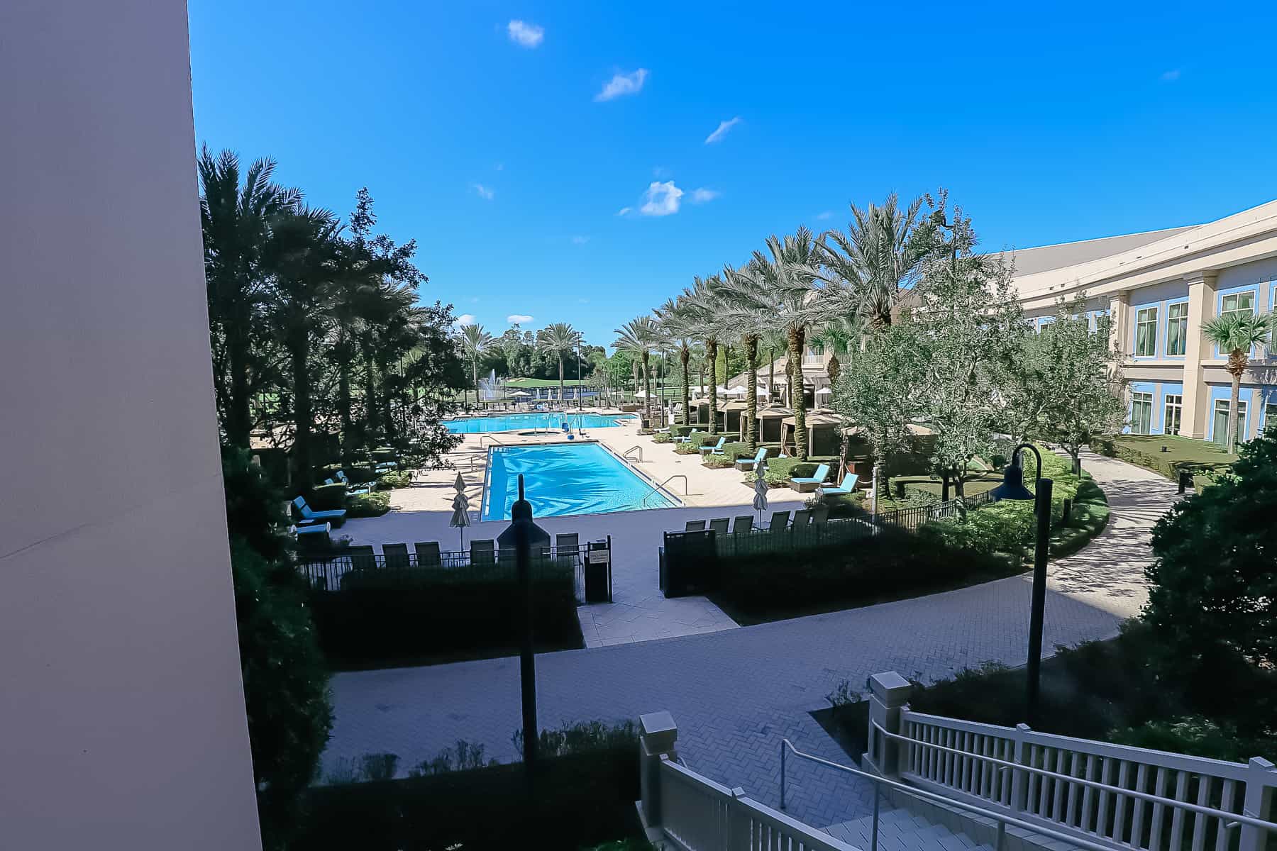 a view of the lap pool from the back deck of the Waldorf Astoria at Bonnet Creek 