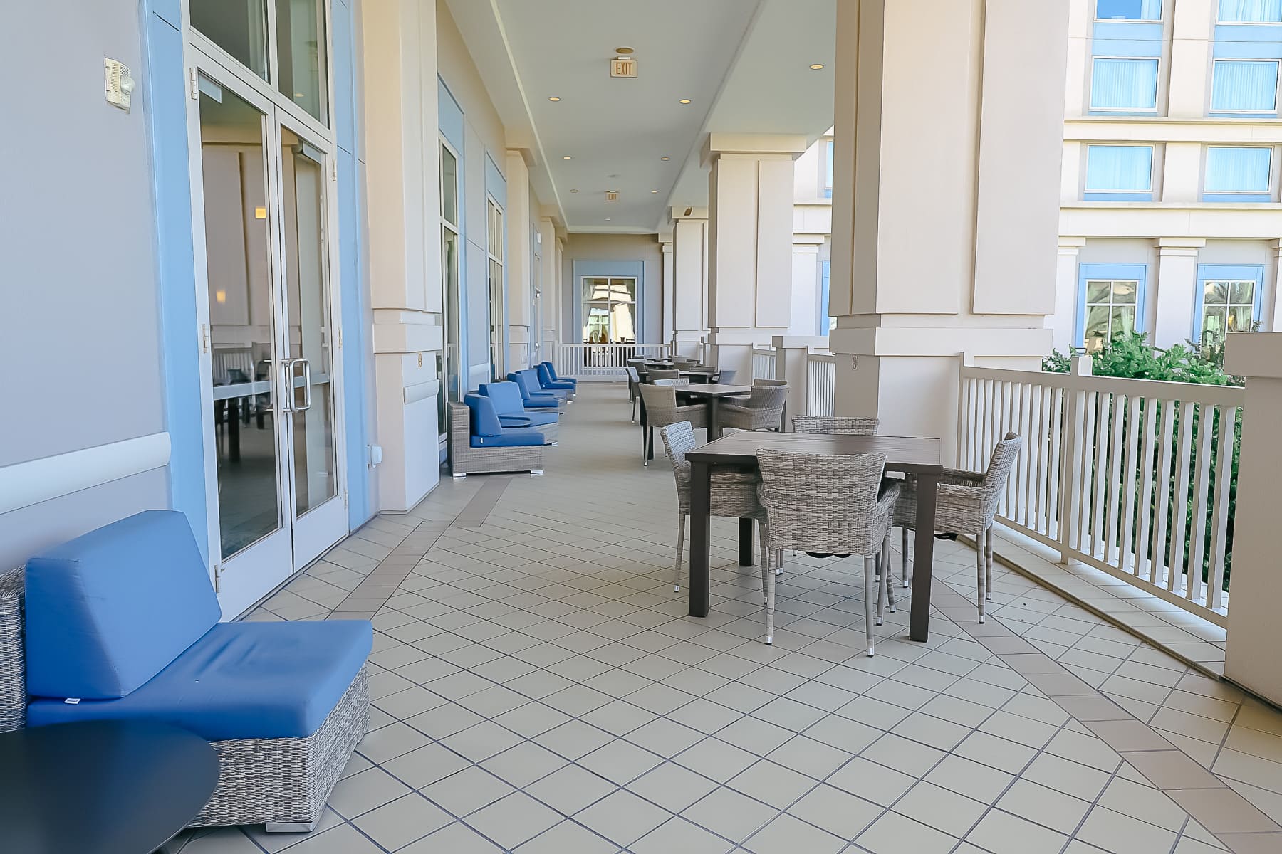a large outdoor covered sitting area is  off the lobby of the Waldorf Astoria Orlando