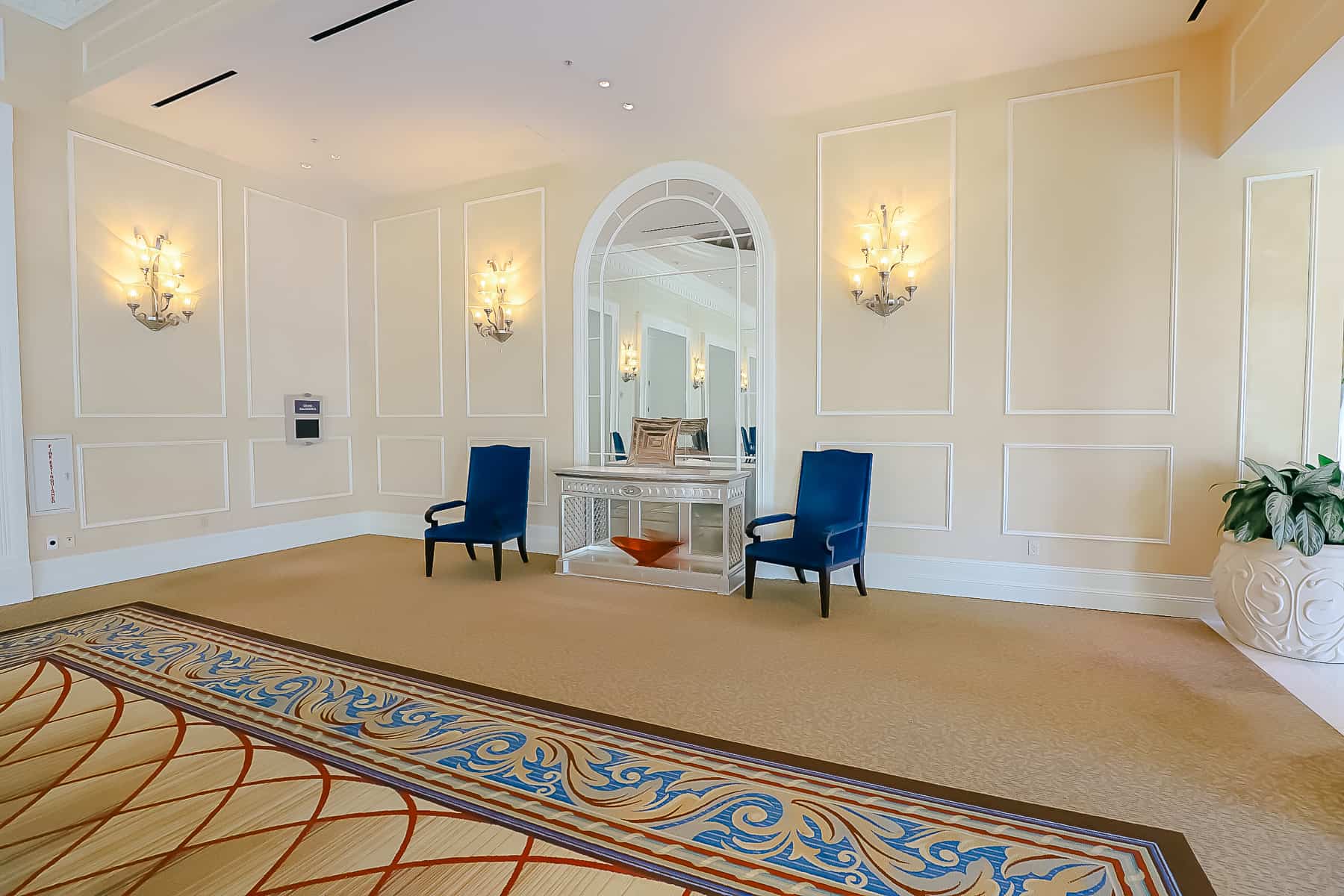 two chairs and decorative furnishings in an interior sitting area 