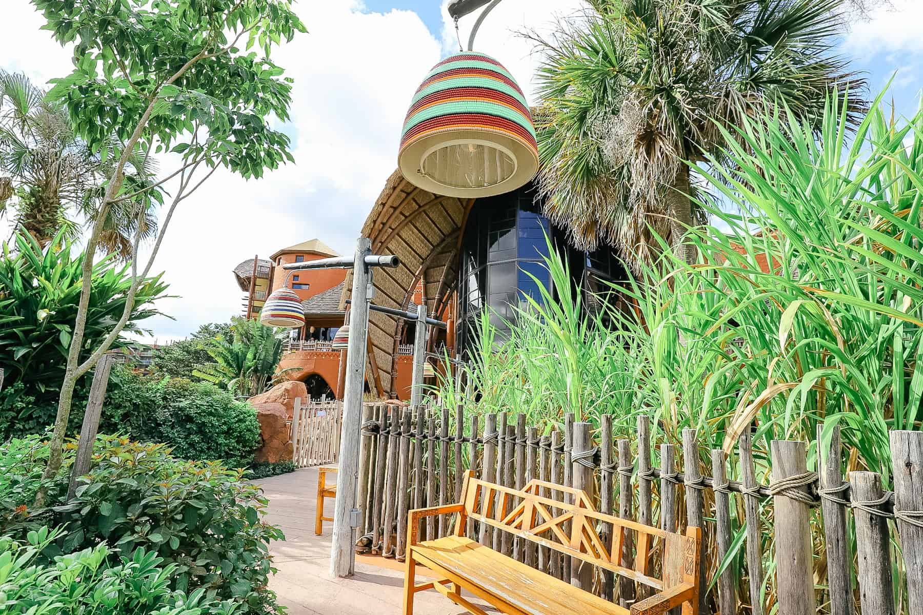 a bench with a lamp at a Disney World Resort 