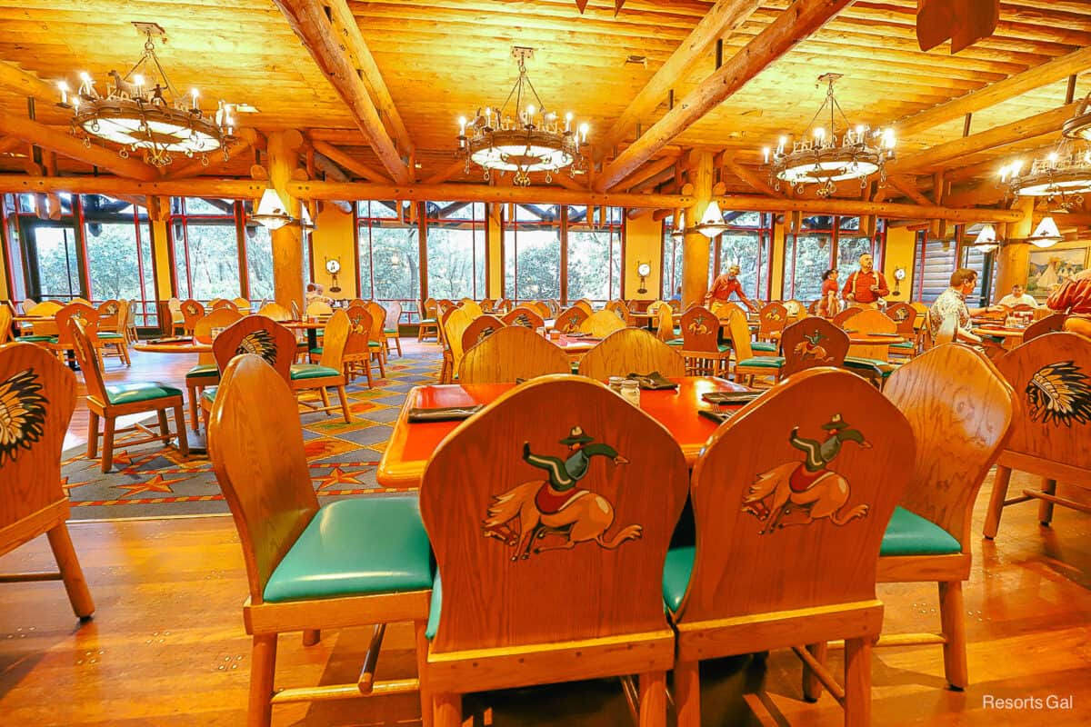 tables and chairs with cowboys and Indians in Whispering Canyon Cafe 