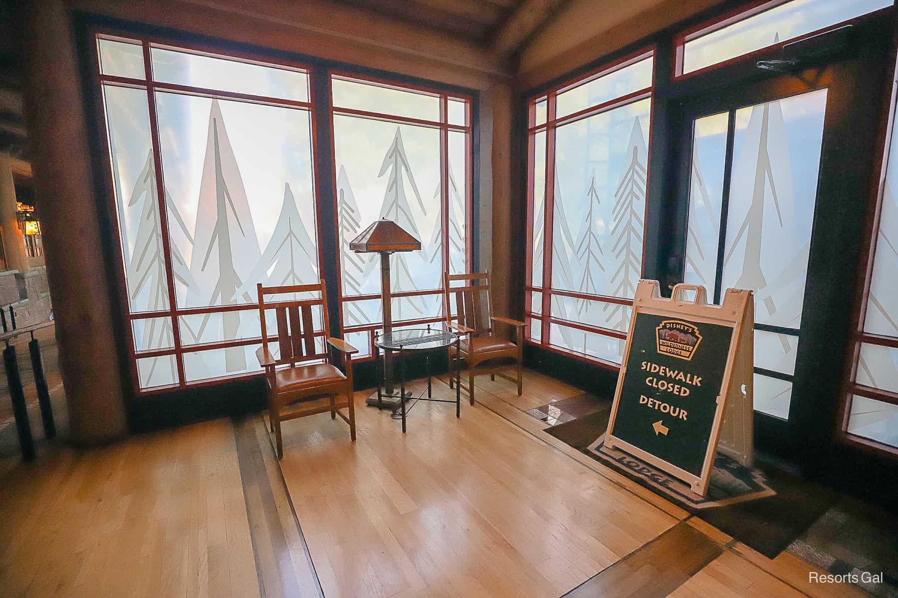 a sign indicating a sidewalk detour around Copper Creek Falls