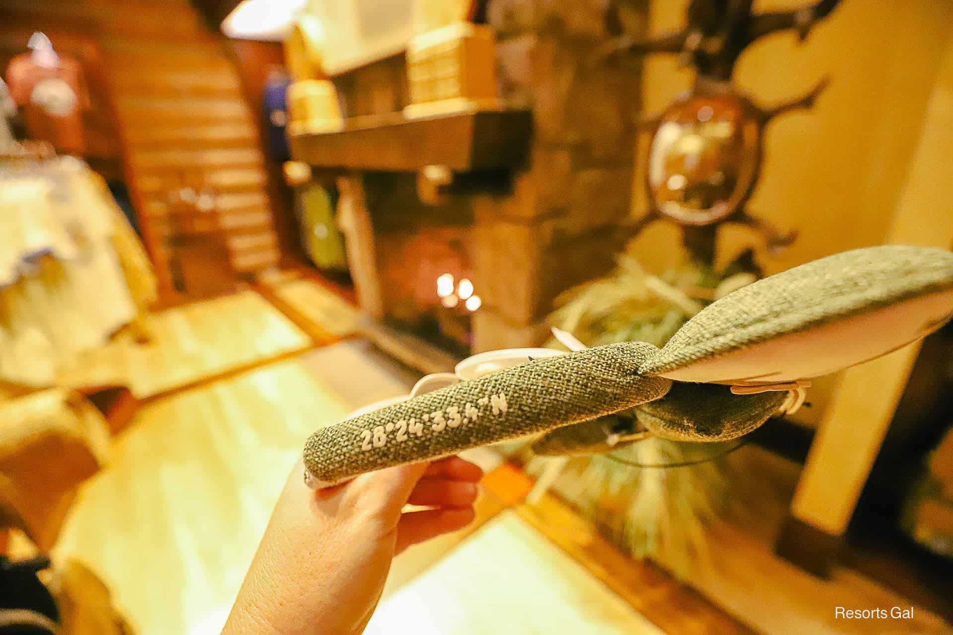 coordinates printed on the side of the ear headband at Wilderness Lodge