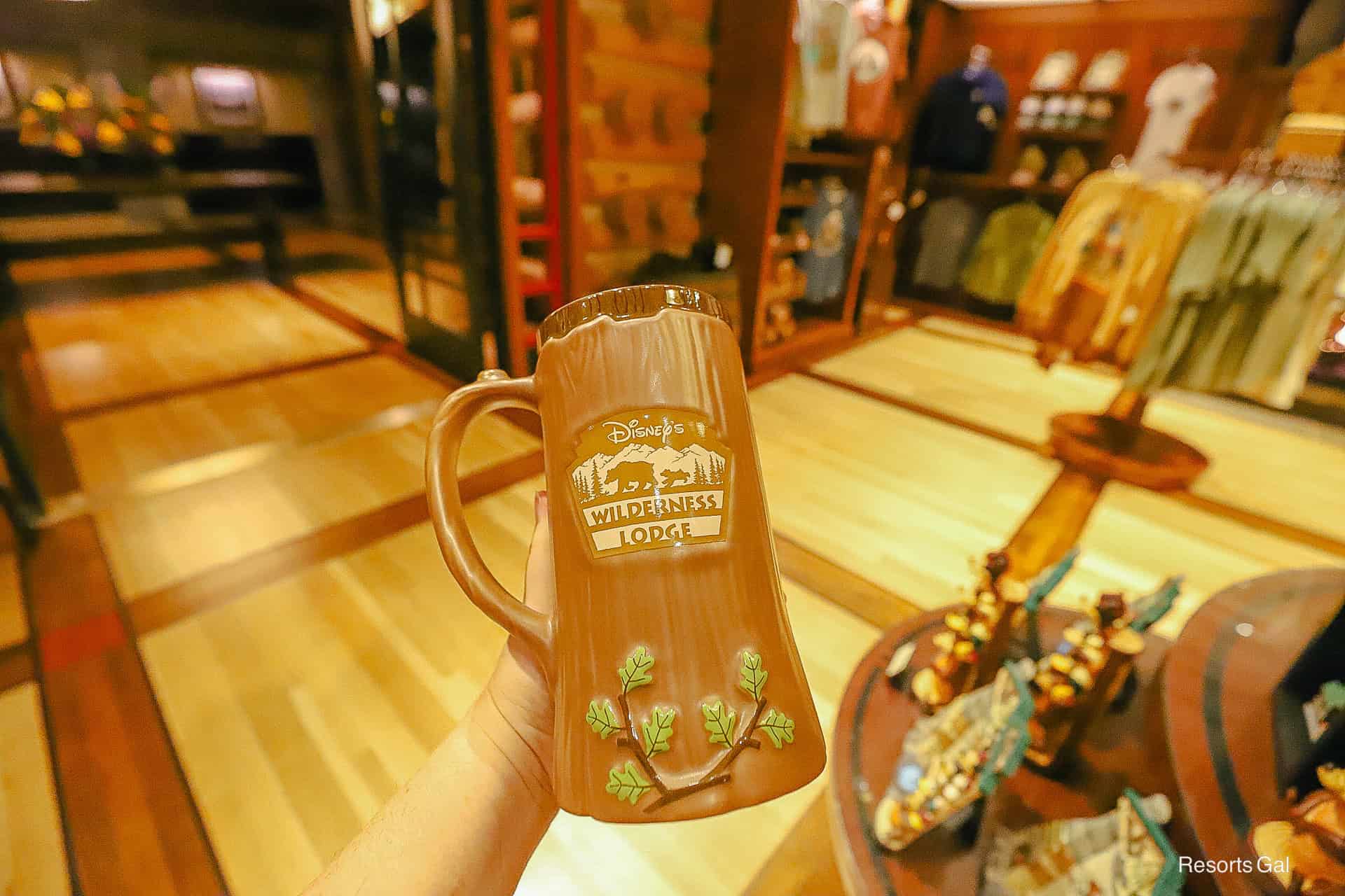 a brown stein with the Disney's Wilderness Lodge logo