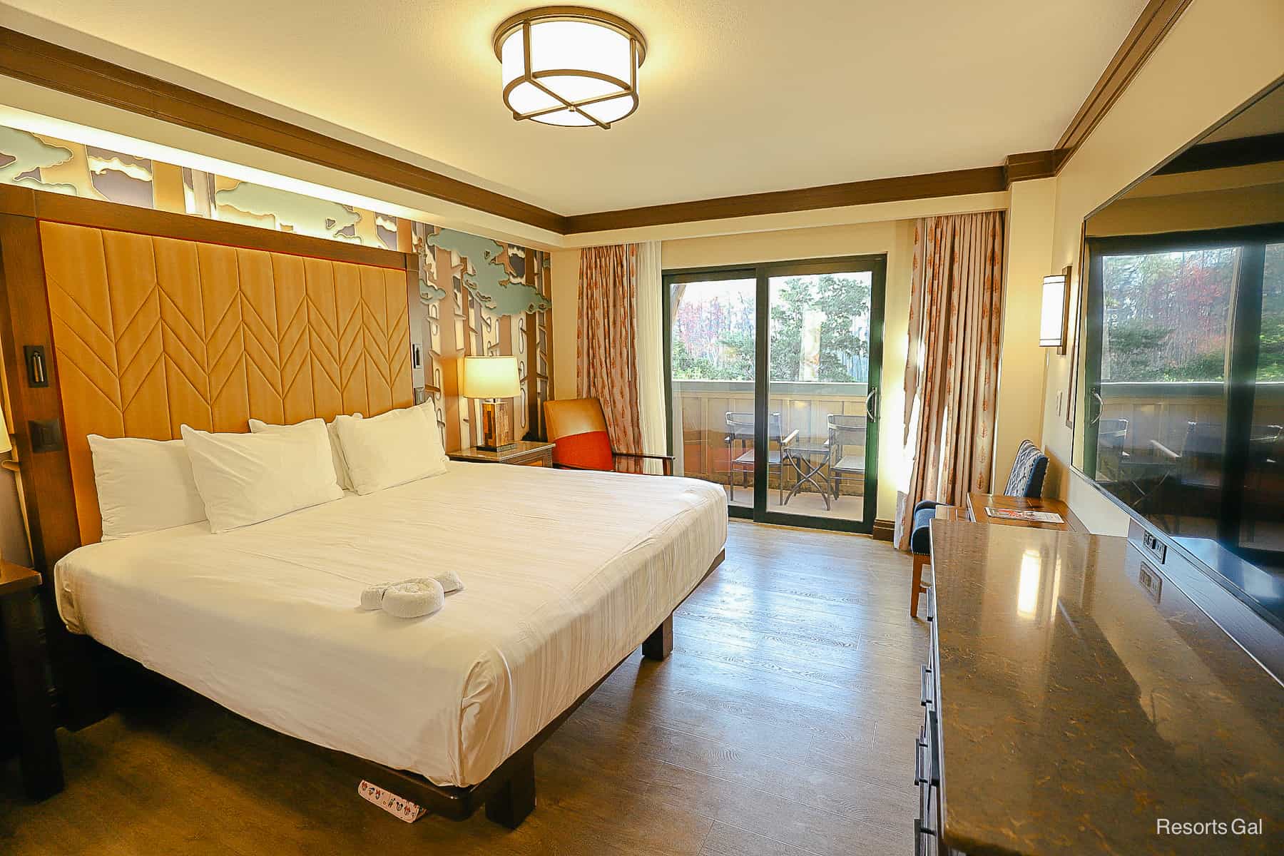 a room at Disney's Wilderness Lodge with a king size bed and solid surface floors