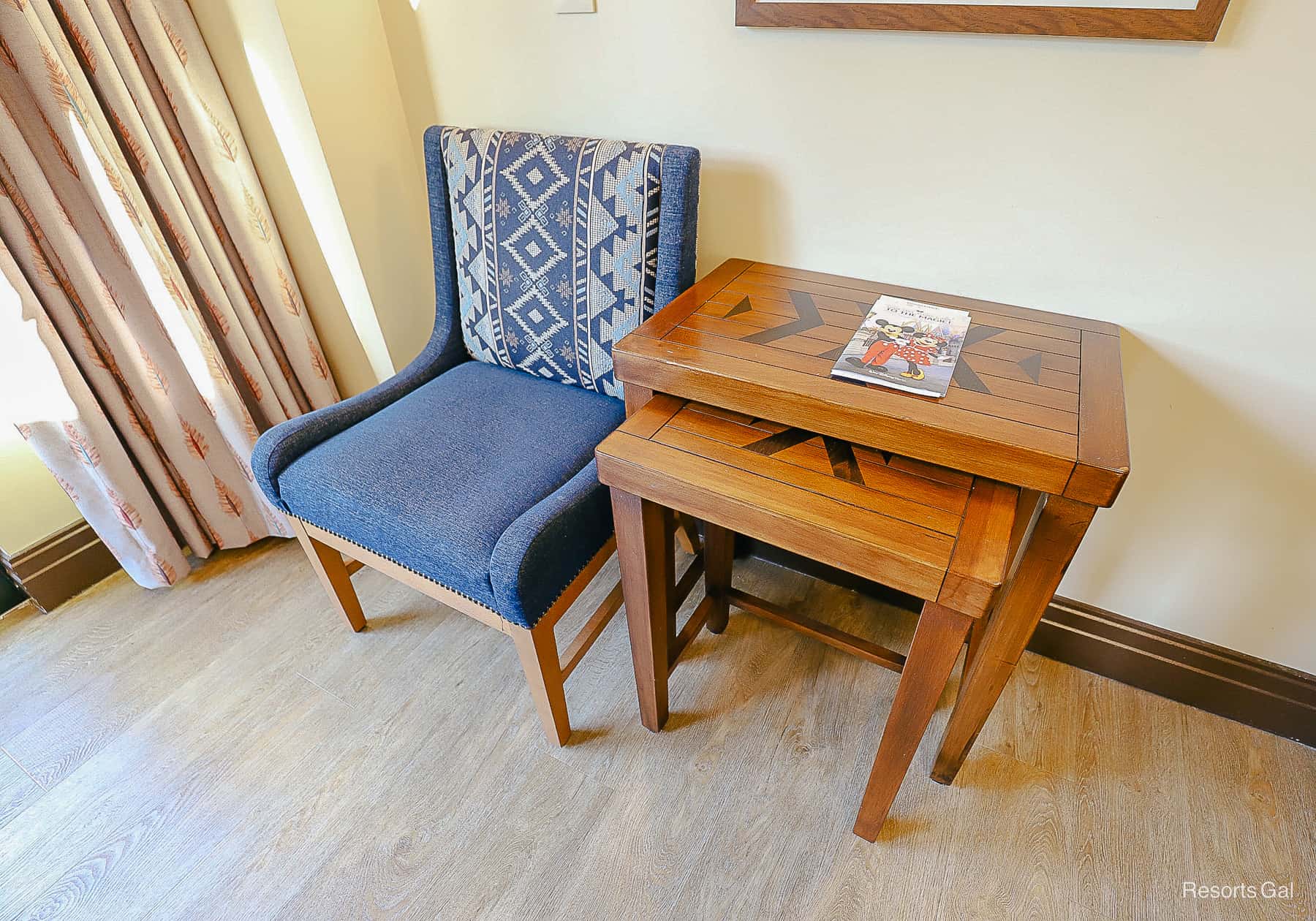 a chair with two nesting tables 