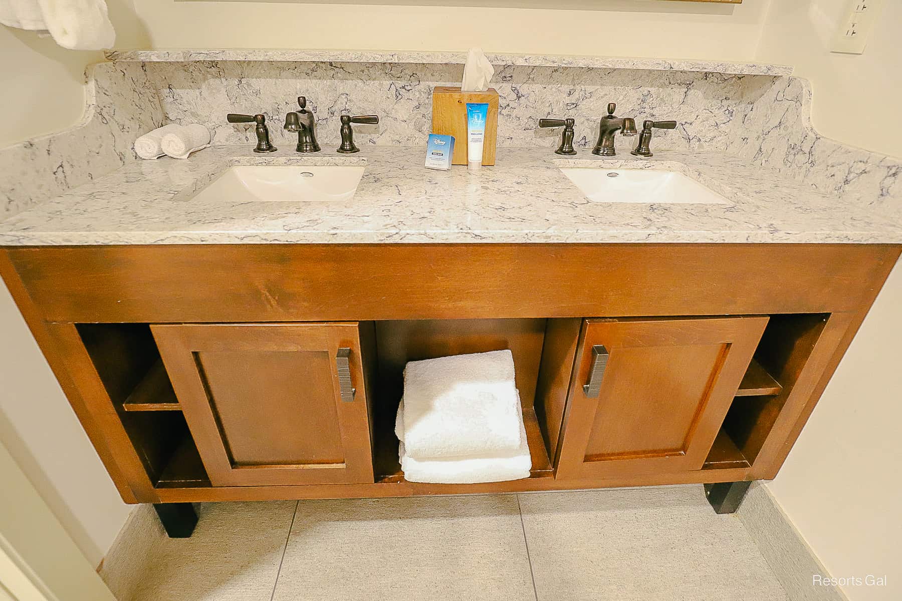 shows the storage space under the guest bath vanity 