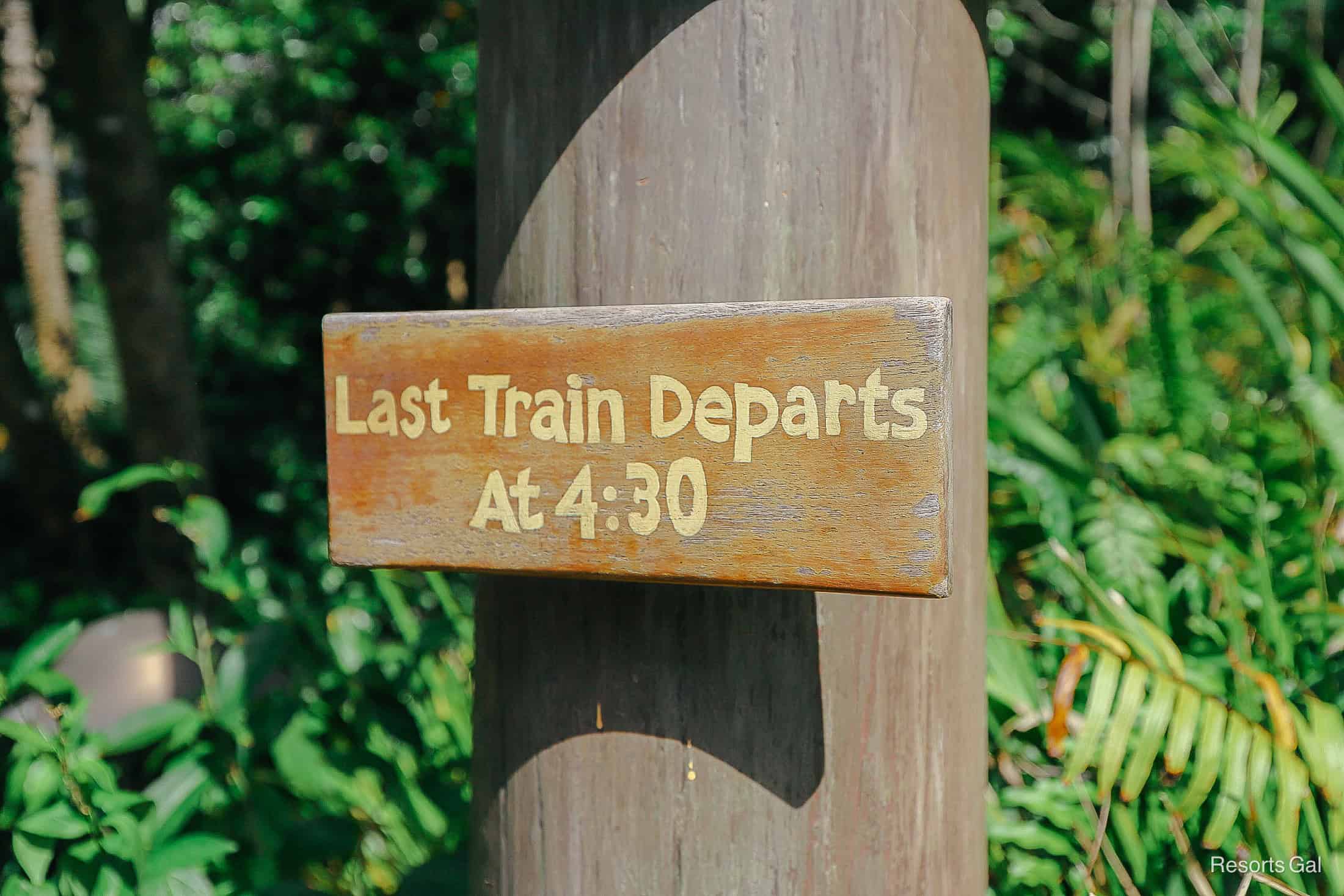 a sign near the entrance that shows the last time the Wildlife Express train departs 