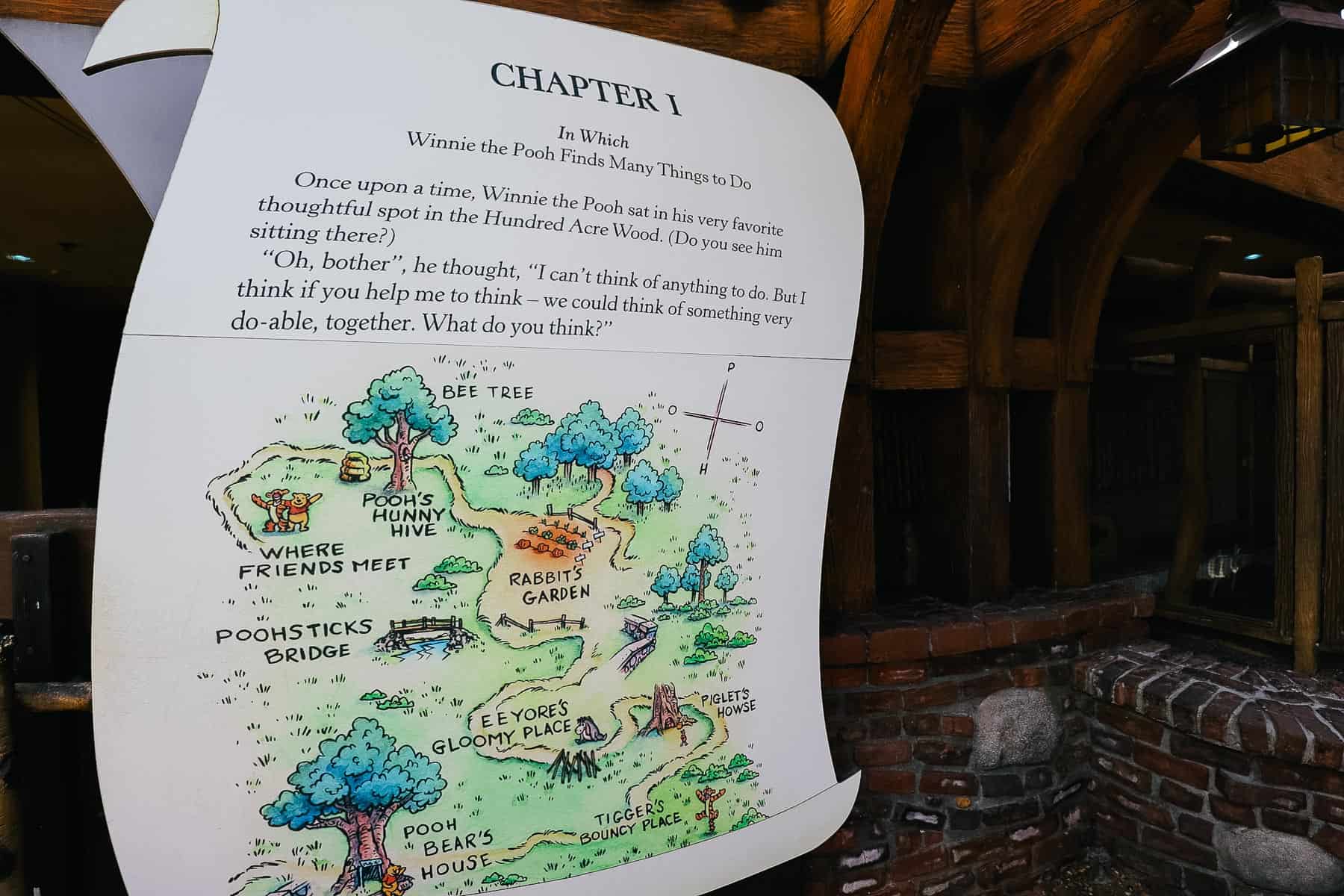 A giant page that starts with Chapter 1 of The Many Adventures of Winnie the Pooh attraction. 