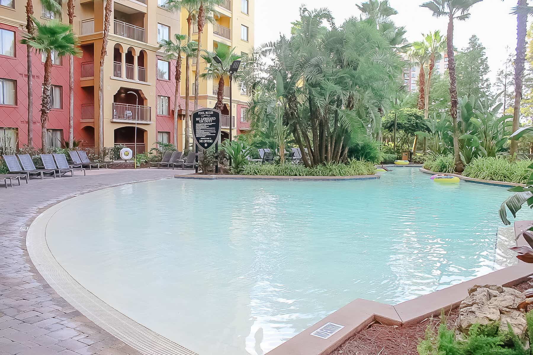 a zero depth entry area to the lazy river at one of the tower pools at Wyndham Grand Orlando 