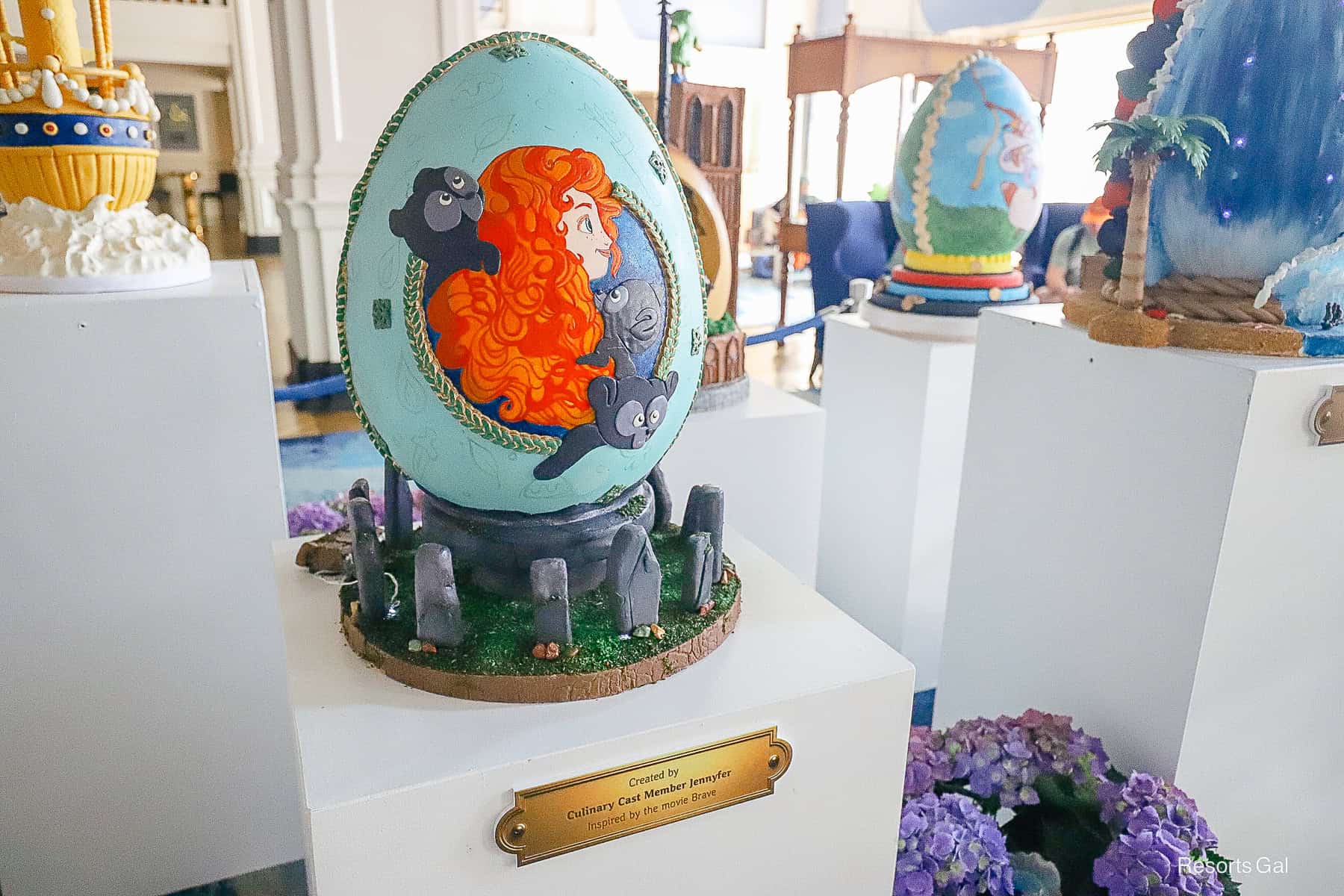 Merida with her three brothers as bear cubs painted on the front of the Easter Egg 