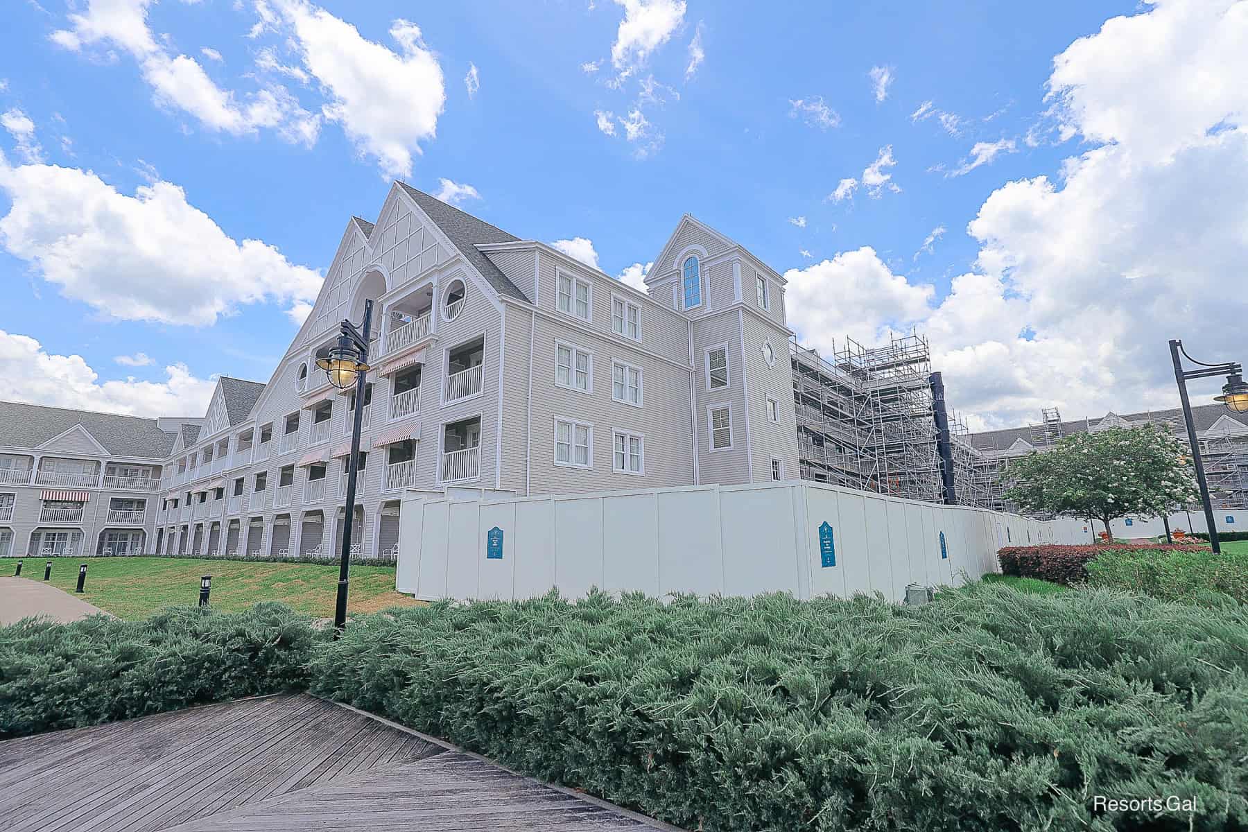 a fence that protects the exterior area of the Yacht Club that's under refurbishment