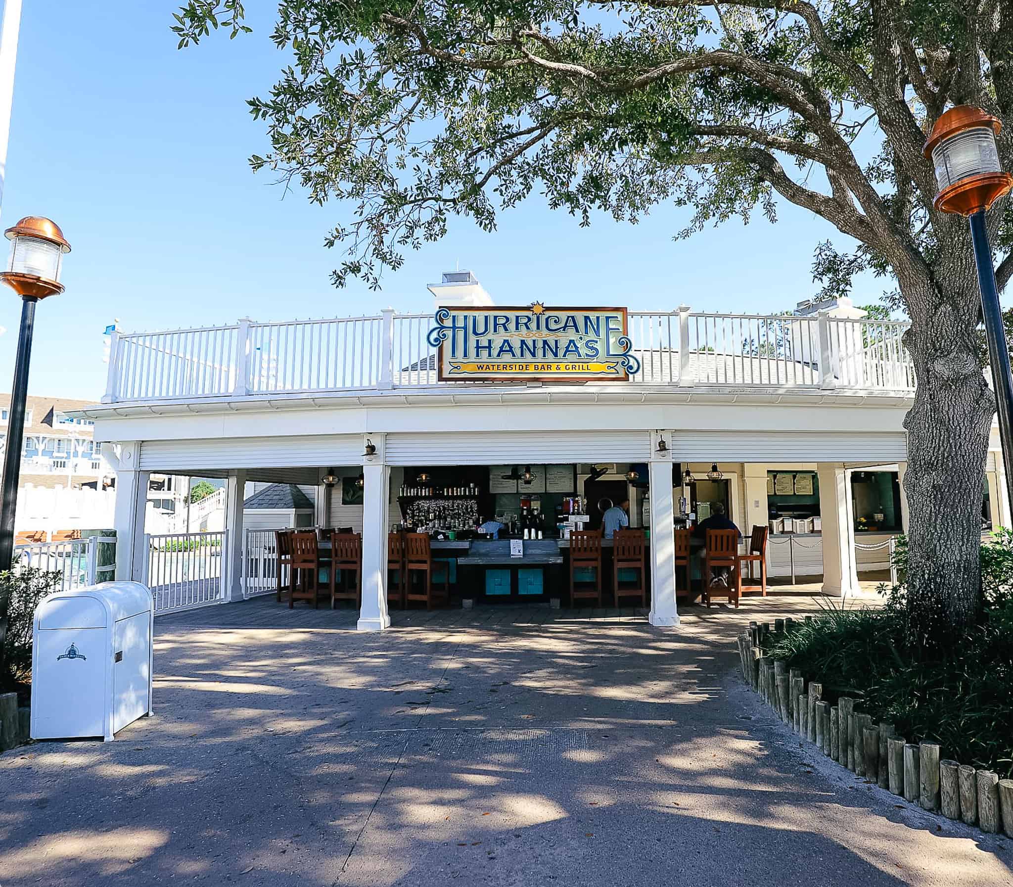 the entrance of Hurricane Hanna's with a sign over it that read Waterside Bar and Grill 