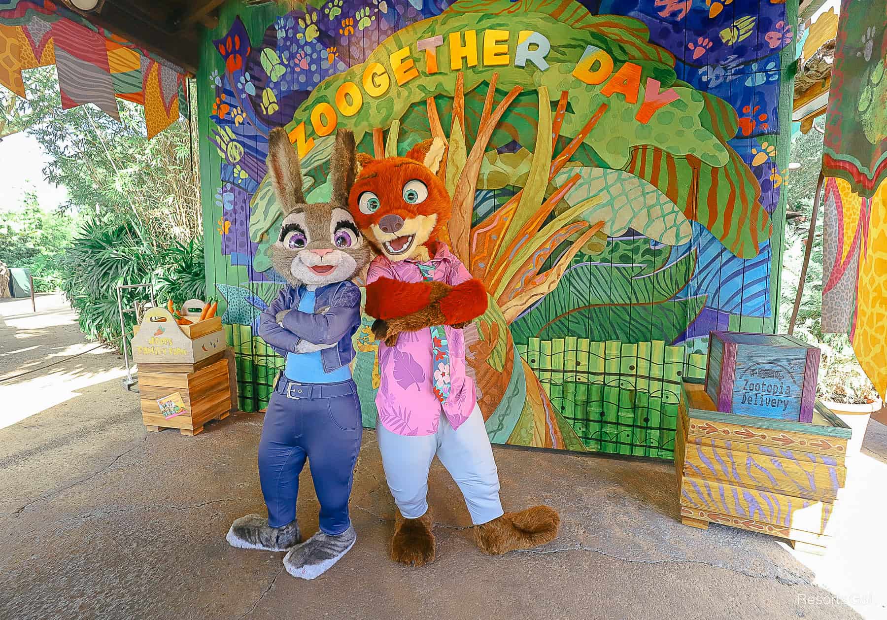 Judy Hopps and Nick Wilde pose with arms crossed for a photo.